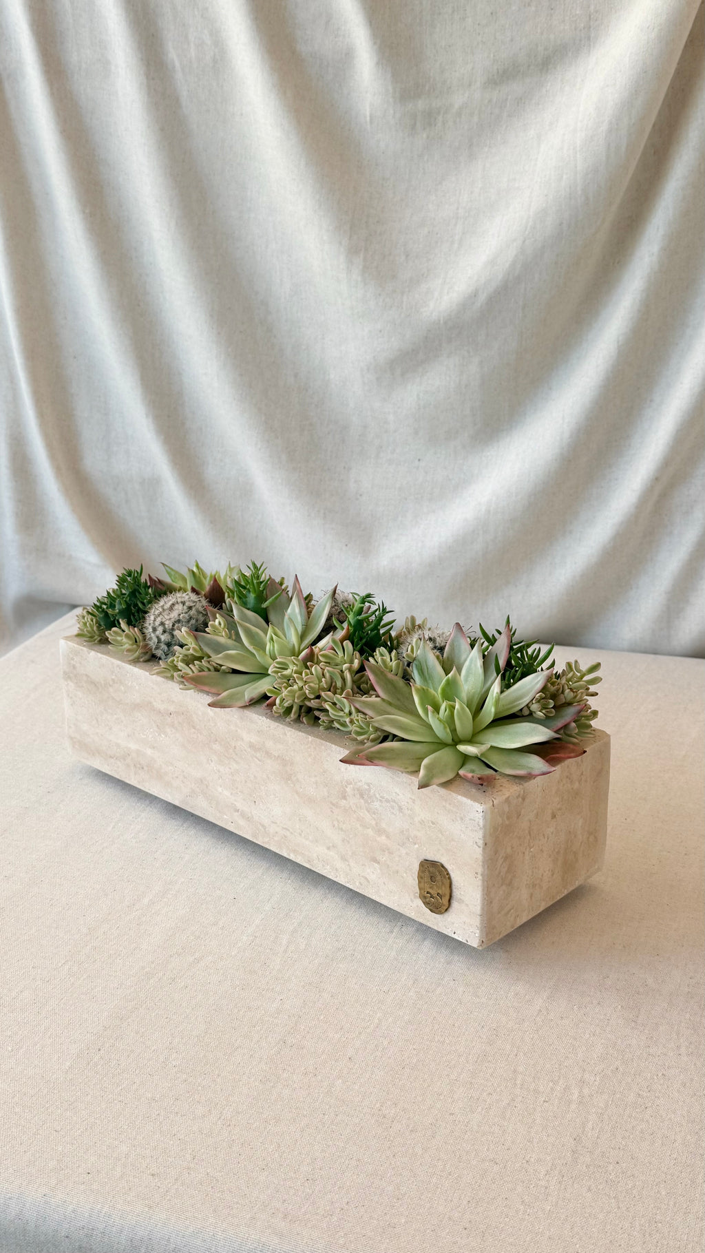 Beige travertine pot